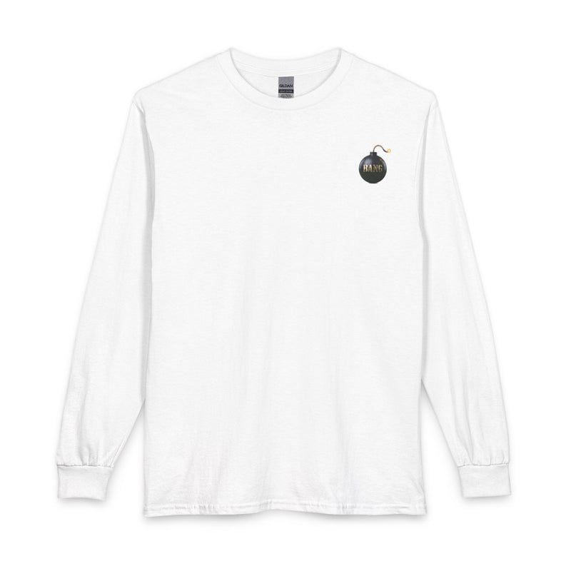 A white long-sleeve crewneck t-shirt with a small circular graphic on the left chest depicting a black bomb with a lit fuse and the word 'DIE'.